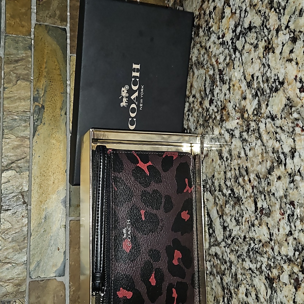 NWT & boxed COACH Leopard Wristlet Style F38688 in Oxblood